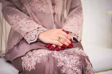 Wall Mural - Bride hand with beautiful ring on wedding dress.