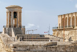 Fototapeta Uliczki - The Siege Bell War Memorial and Lower Barrakka Gardens, Valletta, Malta