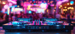 console DJ mixer in booth on table in night club at party against background of people dancing