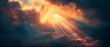 A beautiful conceptual meditation background showing the sun beams or rays breaking through dark clouds at sunset. God's mercy and grace are evident with this beautiful background.