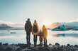 Family admiring beautiful glacier lagoon in Iceland.