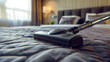 Bringing hotel-level cleaning to the home, vacuum cleaner in action on a bed, domestic tidiness concept