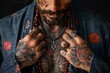© TPS Studio - This man's beard, vibrant tattoos, and denim clothing reflect individualism and contemporary fashion statements