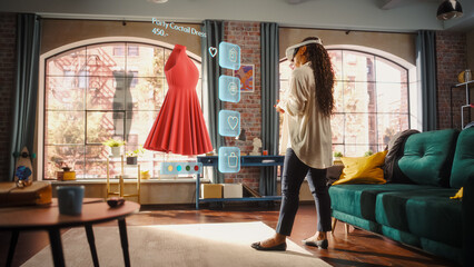 Black Woman Using Virtual Reality Headset for Online Shopping, Browsing through Dresses and Clothing items. Ordering from Mock-up Internet Store App for e-Commerce products. Augmented Reality