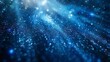 Glimmering stardust spreads across deep blue