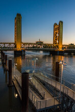 Tower Bridge And Lights Reflected On The Sacramento River. Sacramento And Yolo Counties, California, USA.