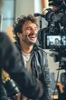 A man laughing in front of a camera. Ideal for social media and advertising