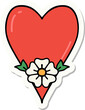 sticker of tattoo in traditional style of a heart and flower