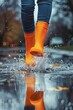 © Alexander LW - Close-up of a woman wearing orange rubber boots. generative ai
