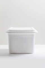 Poster - A white container placed on a table, suitable for various concepts and designs