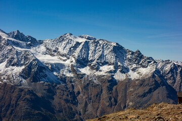 Wall Mural - Snow covered peaks of the Swiss Alps on a sunny day, Switzerland