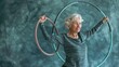 Exercise with a hula hoop by an elderly woman