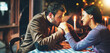 © peopleimages.com - Romance, man and woman on date, night and kiss on hands with eye contact for anniversary together. Restaurant, fine dining and dinner for couple, love and female person in relationship with partner