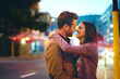 © peopleimages.com - Couple, night and city with hug for romance, bonding and love in relationship with life partner. Happiness, affection and people with commitment and trust, sweet moment and romantic together outdoor