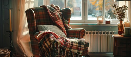 Poster - Chair, plaid blanket, lamp by window