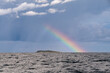 Rainbow and rainclouds, stormy skies over Hjelm Island, Kattegat, Denmark