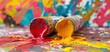 Scene depicting three paint tubes releasing colorful streams of paint
