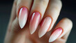 Gel nail extension pink colored. Multicolored manicure with different shades of pink nail Polish on women's hand. close up