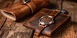 Vintage leather wallet and watch, close-up, warm wood background for Father's Day 