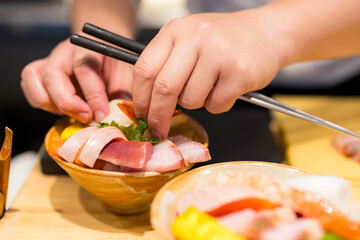 Canvas Print - Japanese chef make of sashimi rice bowl