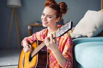 Sticker - Photo of cute positive girl toothy smile good mood enjoy playing guitar free time chill apartment inside