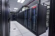 Modern data center with rows of server racks and LED status lights