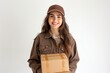 Female courier with parcel on light background