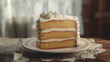 A close-up of a delectable slice of tres leches cake with whipped cream peaks, set on a delicately patterned plate