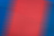 Blue-red blurred abstract background on the theme of martial arts, a background for text or photos.