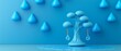 © Jevjenijs - A blue vase atop a table, before a blue wall adorned with numerous water droplets