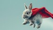 Charming rabbit with a red shroud bouncing and flying on light blue background