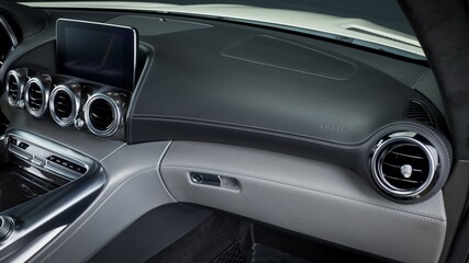 Wall Mural - Black leather car dashboard