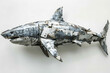 A creatively crafted shark sculpture made from metal parts, isolated on a white background.
