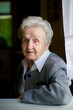 Elderly gray-haired woman portrait.
