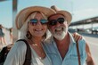 © Juan Manuel Pichardo - retired couple arriving at the airport to go on vacation.