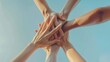 © LUPACO IMAGES - Group of People Putting Their Hands Together