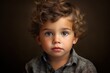 © Volha - portrait of 3 years old boy on gray background