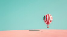  A Red-and-white Striped Hot Air Balloon Soars Above A Pink Sand Dune Against A Backdrop Of A Blue Sky