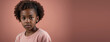© Pixel Matrix - An African American Juvenile Girl, Isolated On A Coral Background With Copy Space