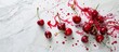 Cherries spilled on marble surface