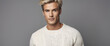 Photo of blond man with short hair wearing a white sweater against a grey background. Generative AI