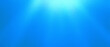 Sun rays. Grainy abstract ultrawide pixel azure ultramarine blue gradient exclusive background. Perfect for design, banners, wallpapers, templates, art, creative projects and desktop. Premium quality