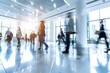 © Anna - Bright business workplace with people in walking in blured motion in modern office space