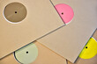 cardboard sleeve vinyl music records with colorful blank labels