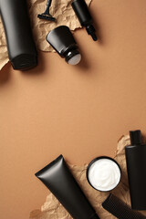 Wall Mural - Set on men's cosmetics on brown background. Natural beauty products for men's grooming, skin care.