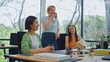 © stockbusters - Relaxed team coworkers talking at break in office close up. Colleagues laughing