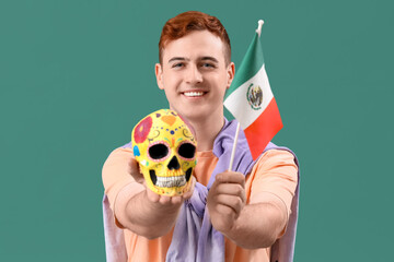 Canvas Print - Young man with Mexican flag and painted skull on green background