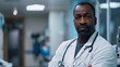Black Male Doctor With A Serious Look On His Face