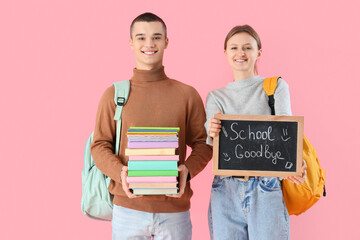 Poster - Students holding books and chalkboard with text SCHOOL GOODBYE on pink background. End of school concept