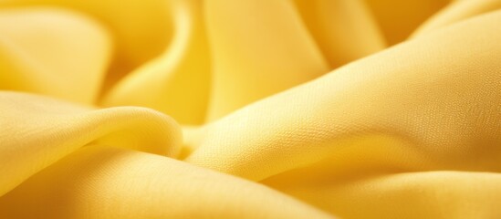 Sticker - Gentle to the touch, a yellow textile showcases a subtle and smooth texture, perfect for various creative projects